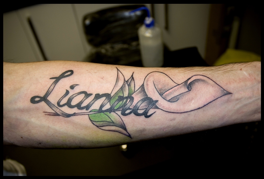 Calla lily arm tattoo Calla lily and name arm tattoo