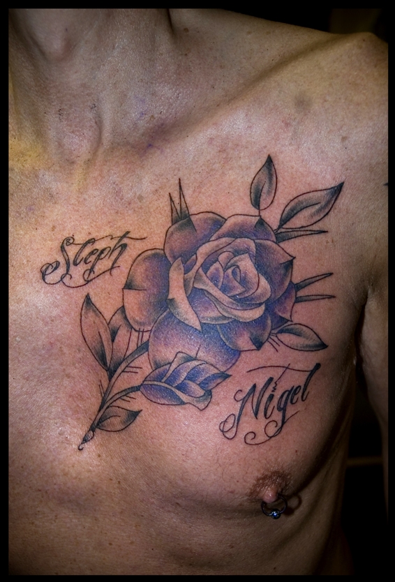 coloured rose chest tattoo