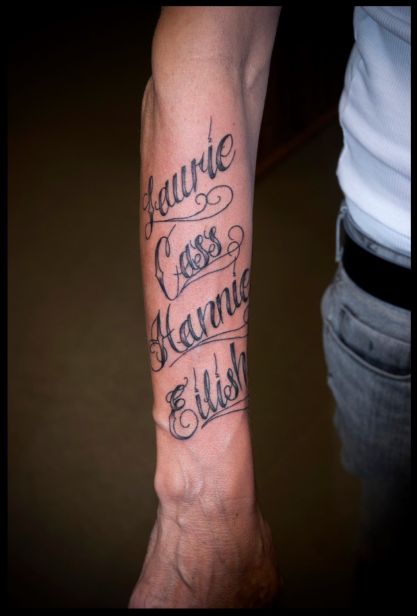 script tattoo cursive