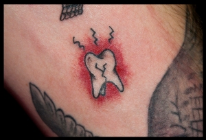 tooth filler tattoo