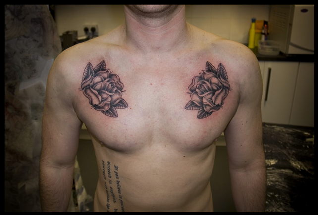 Matching red rose tattoos on the chest Tattoo  Official Tumblr page  for Tattoofilter for Men and Women