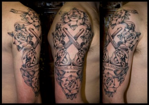 guns and roses tattoo arm